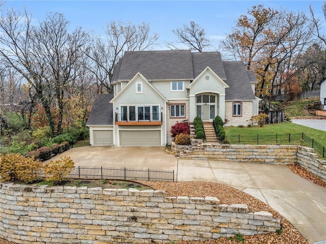 view of front of house featuring a front yard and a garage