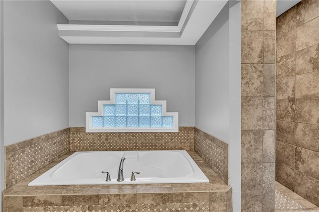 bathroom featuring a relaxing tiled tub