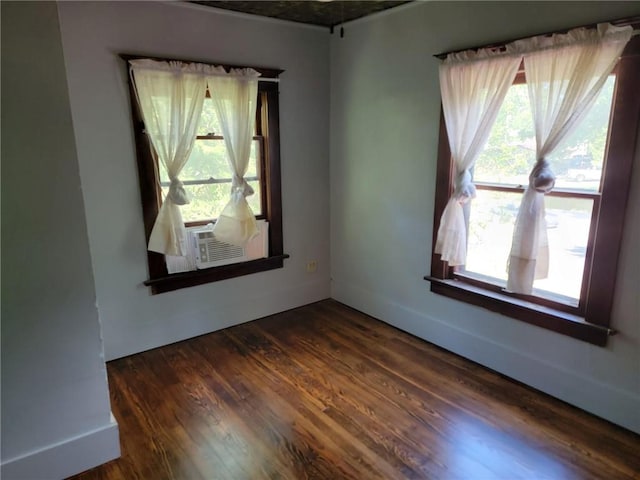 empty room featuring dark hardwood / wood-style floors