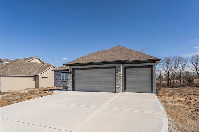 garage featuring driveway