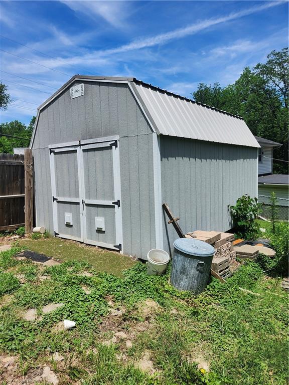 2821 Stark Ave, Kansas City, MO 64129 - view of shed with fence