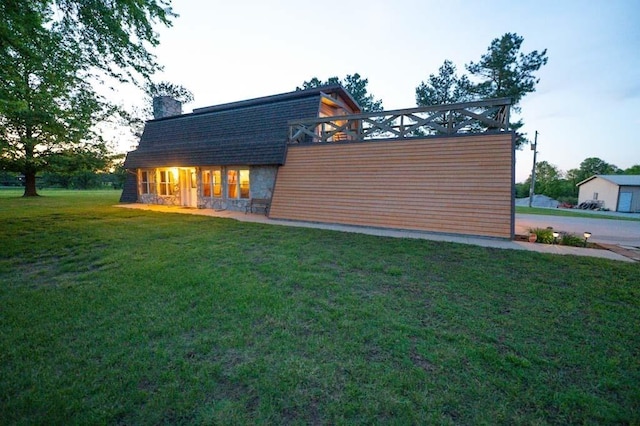 view of property exterior featuring a yard