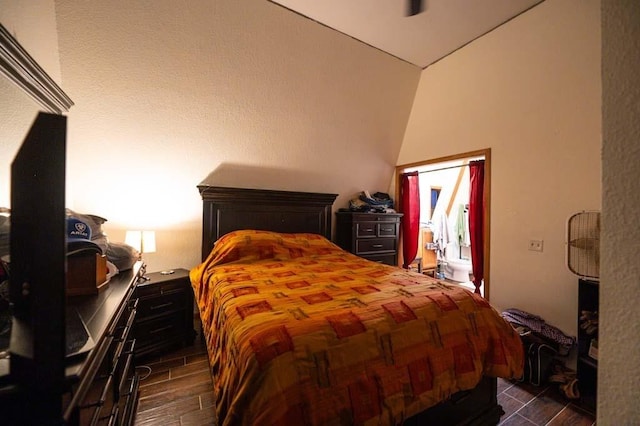 bedroom featuring vaulted ceiling