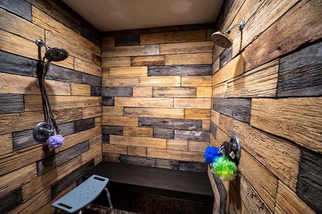 room details with a shower and wood walls