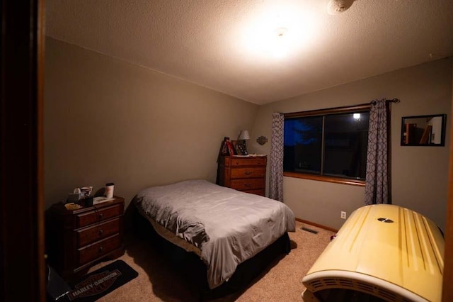 carpeted bedroom featuring lofted ceiling