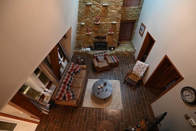 living room featuring a towering ceiling