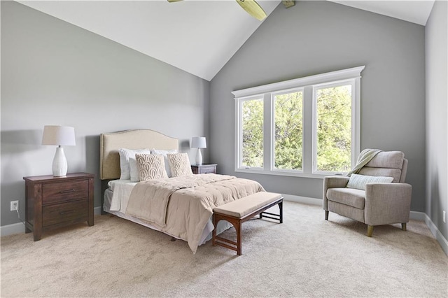 bedroom with light carpet and vaulted ceiling