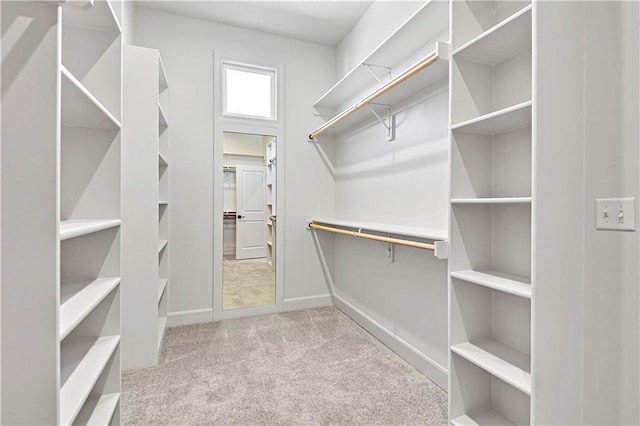 22047 W 94th St, Lenexa, KS 66220 - walk in closet featuring carpet flooring