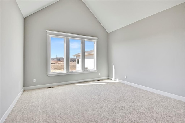 22047 W 94th St, Lenexa, KS 66220 - spare room featuring vaulted ceiling and carpet