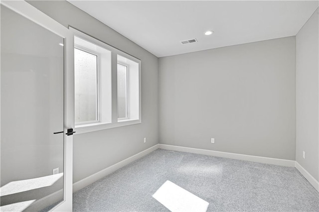 22047 W 94th St, Lenexa, KS 66220 - carpeted empty room featuring baseboards and recessed lighting