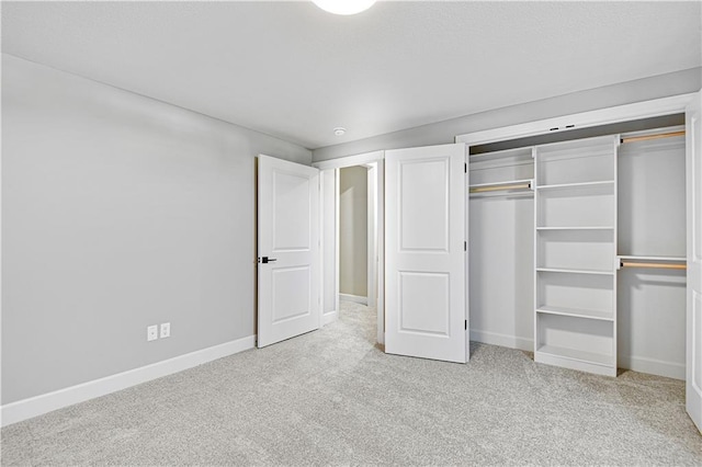 22047 W 94th St, Lenexa, KS 66220 - unfurnished bedroom featuring carpet flooring and a closet