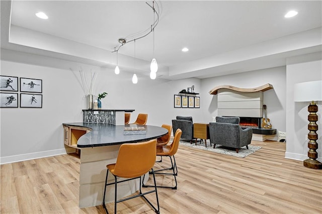 dining space featuring light hardwood / wood-style floors