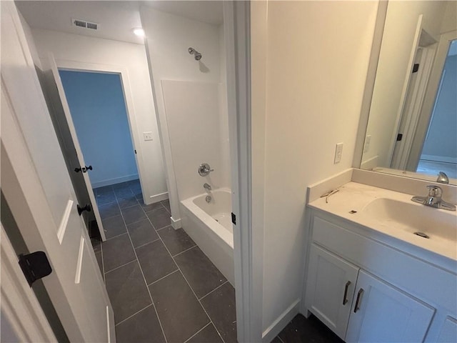 bathroom featuring shower / bath combination, tile patterned flooring, and vanity