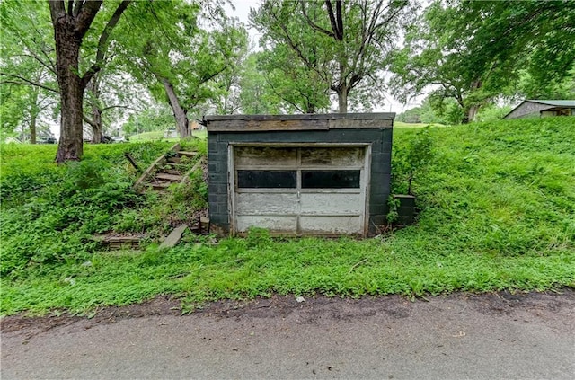 view of outdoor structure with a garage