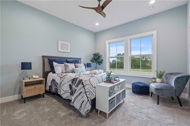 bedroom with ceiling fan and carpet flooring