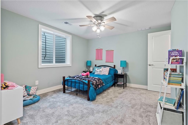 carpeted bedroom with ceiling fan