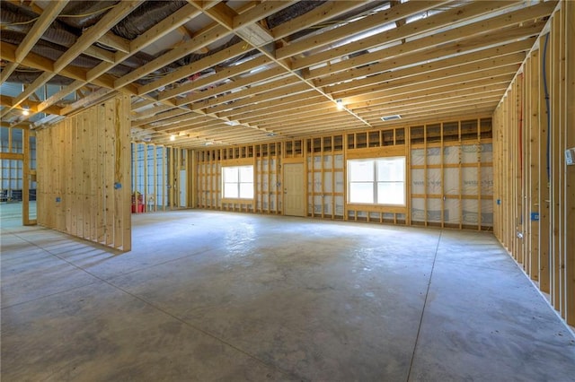 miscellaneous room with plenty of natural light and concrete flooring