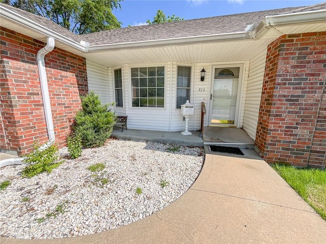 doorway to property featuring a porch