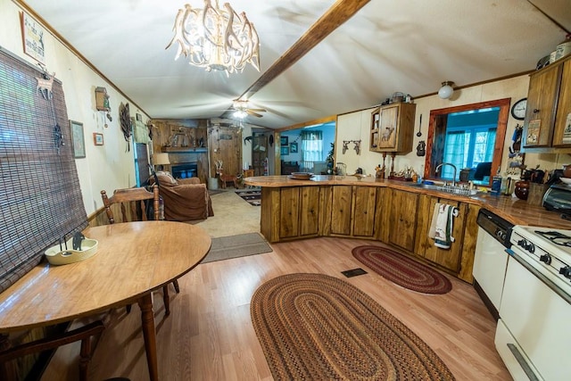 kitchen with light hardwood / wood-style flooring, white appliances, ceiling fan with notable chandelier, sink, and lofted ceiling