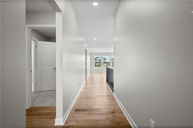 corridor featuring light hardwood / wood-style flooring