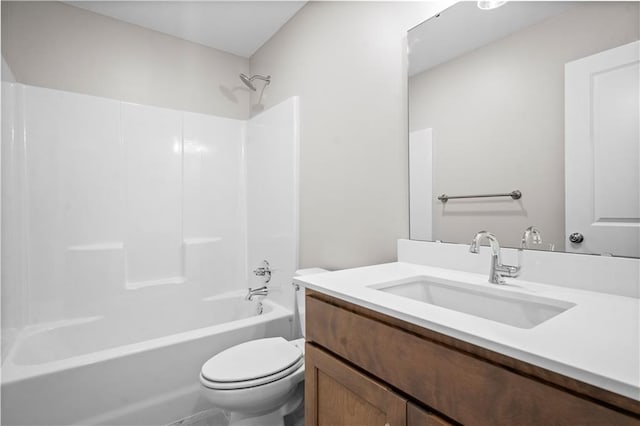 full bathroom with vanity, toilet, and shower / washtub combination