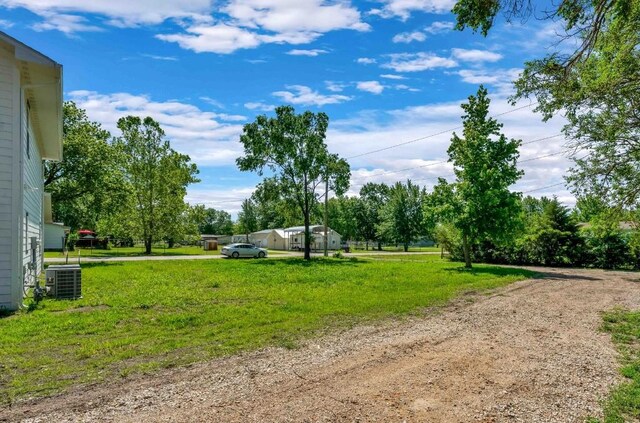 view of yard featuring central AC