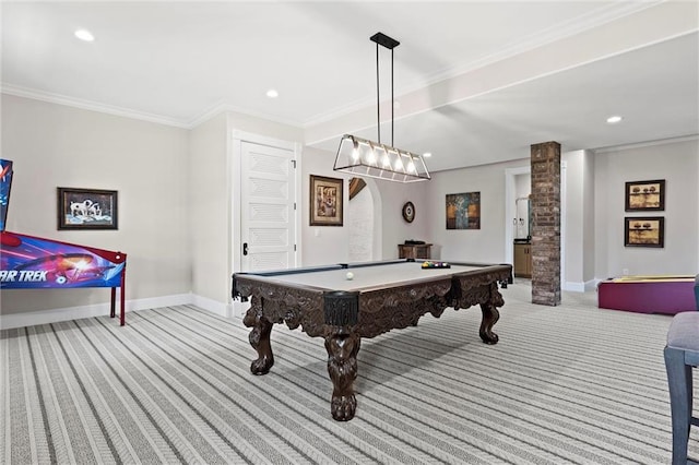 playroom featuring ornamental molding, baseboards, arched walkways, and light colored carpet