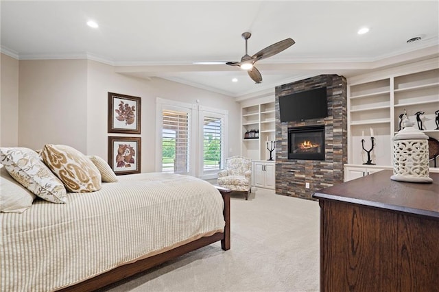 bedroom with crown molding, a fireplace, recessed lighting, light carpet, and ceiling fan