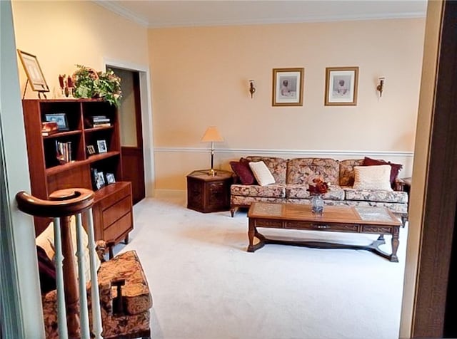 carpeted living room with crown molding