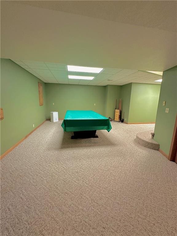 recreation room featuring pool table, carpet flooring, and a drop ceiling