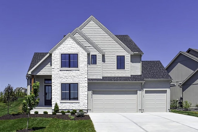 view of front of home with a garage