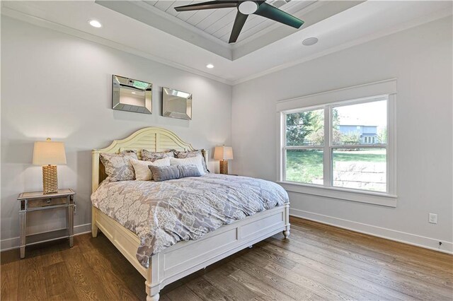 24932 W 98th Pl, Lenexa, KS 66227 - bedroom with a tray ceiling, dark wood finished floors, baseboards, ornamental molding, and ceiling fan