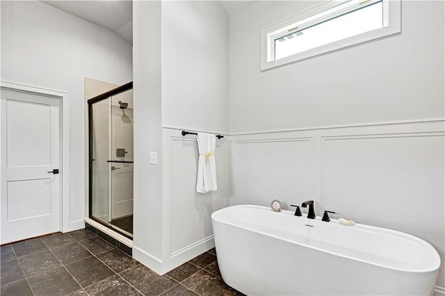 24932 W 98th Pl, Lenexa, KS 66227 - full bathroom featuring a shower stall, a freestanding tub, a decorative wall, and a wainscoted wall