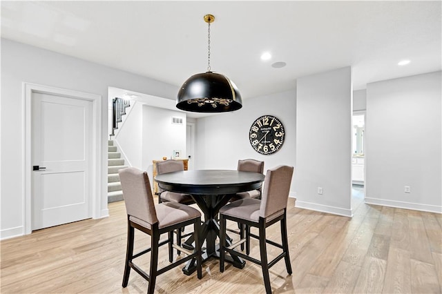 24932 W 98th Pl, Lenexa, KS 66227 - dining room featuring stairs, light wood finished floors, baseboards, and recessed lighting