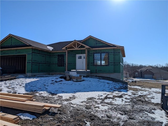 property under construction featuring a garage