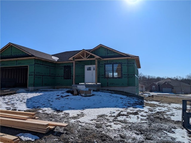 property under construction featuring an attached garage