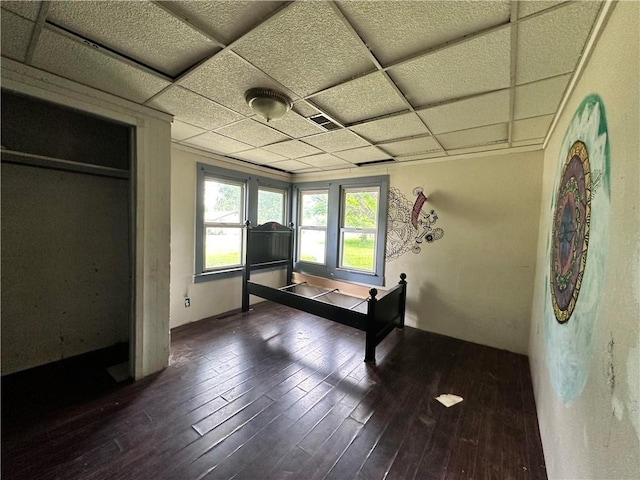 321 Pecan St, Chetopa, KS 67336 - unfurnished bedroom with wood finished floors