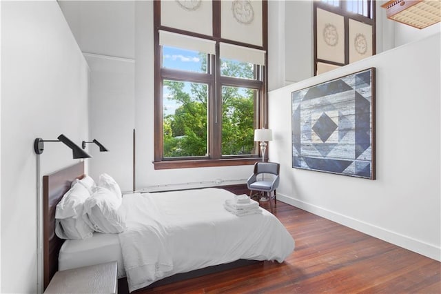 bedroom with wood-type flooring