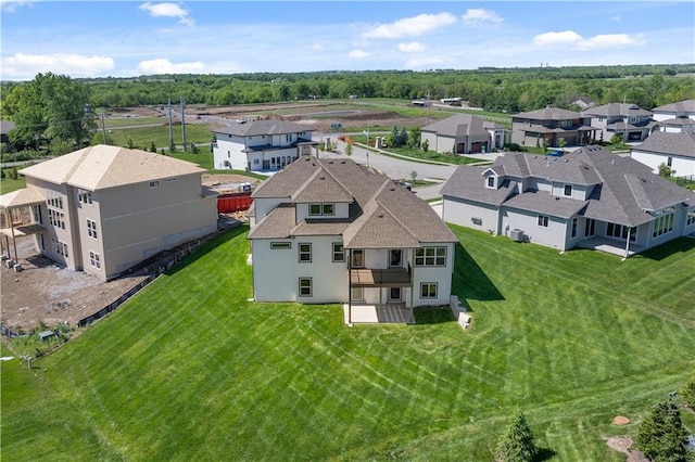 drone / aerial view with a residential view