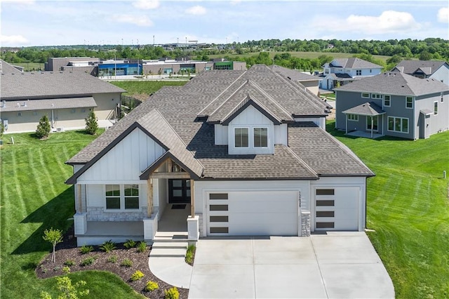 view of front of home featuring stone siding, concrete driveway, roof with shingles, and a front lawn