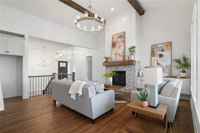 living room featuring a stone fireplace, high vaulted ceiling, a chandelier, dark hardwood / wood-style flooring, and beamed ceiling