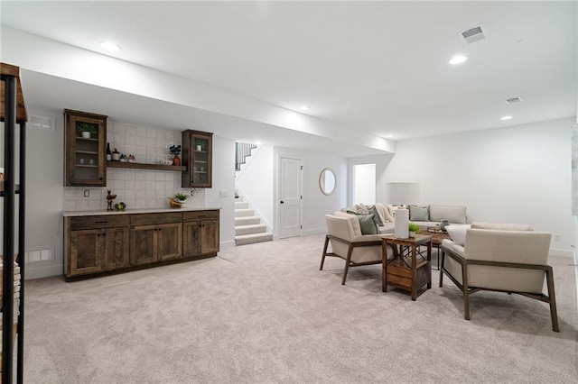 living room featuring light colored carpet