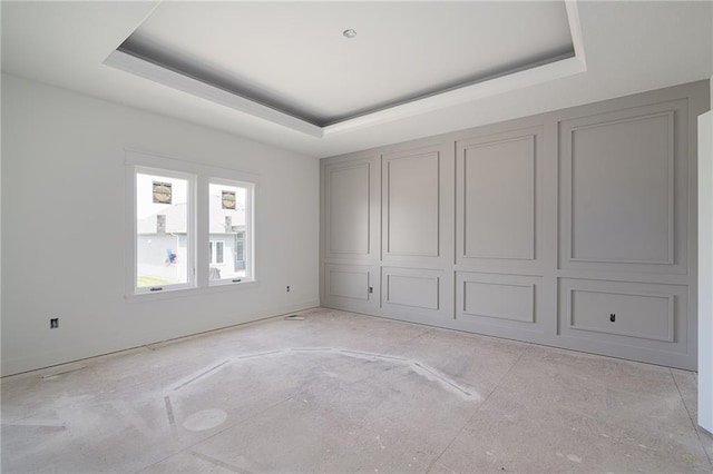 9346 Gander St, Lenexa, KS 66227 - unfurnished bedroom featuring a tray ceiling