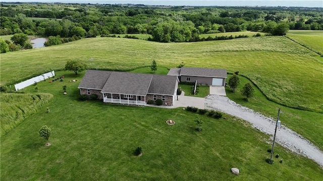 aerial view featuring a rural view and a view of trees