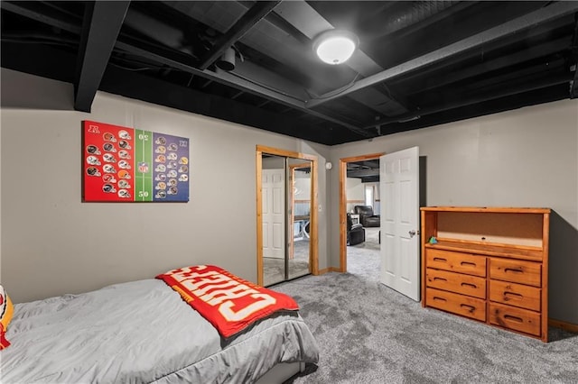 bedroom featuring a closet and carpet flooring