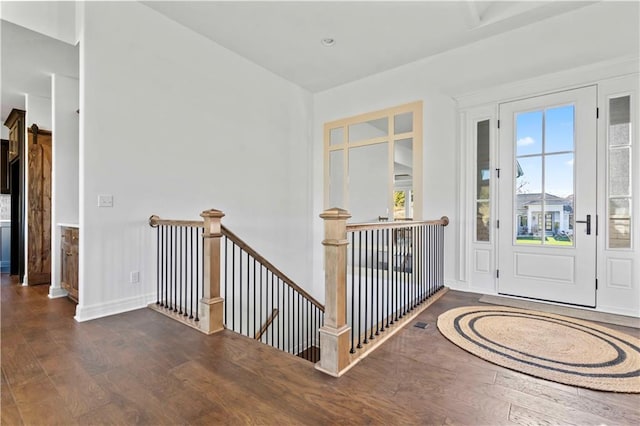 foyer entrance featuring dark hardwood / wood-style flooring