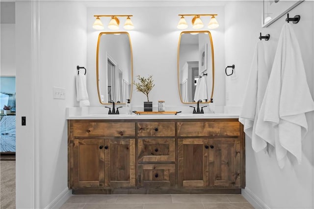 1600 SW 27th St, Lees Summit, MO 64082 - ensuite bathroom with double vanity, tile patterned floors, and baseboards