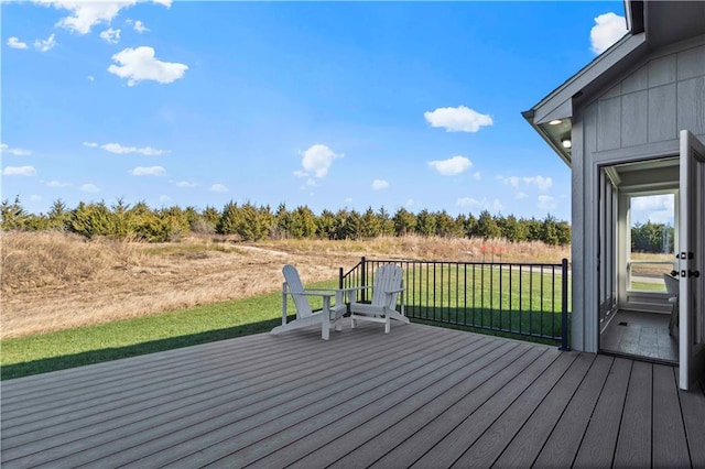 wooden deck with a lawn