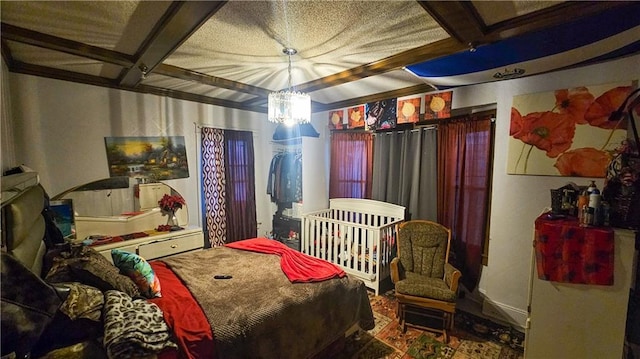 bedroom featuring a notable chandelier