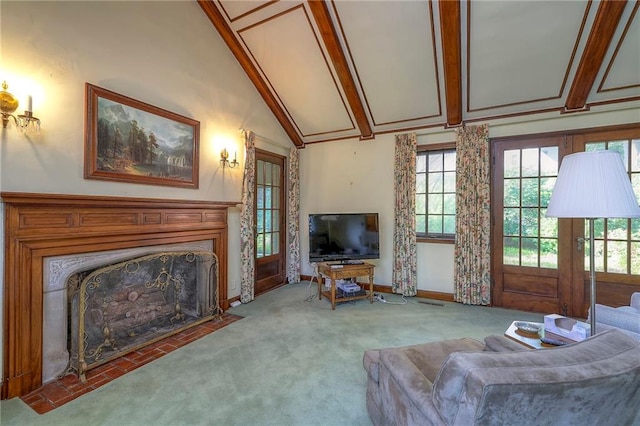 carpeted living room with vaulted ceiling